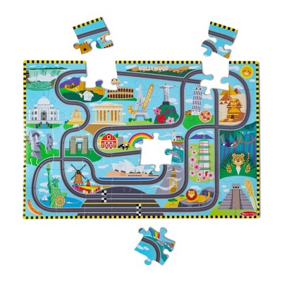 Melissa & Doug Race Around the World Tracks Cardboard Jigsaw Floor Puzzle and Wind-Up Vehicles   48pc