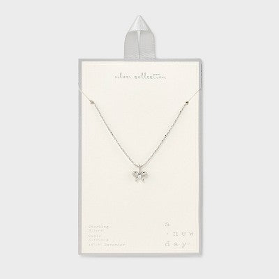 Sterling Silver Polished Bow with Center Cubic Zirconia Pendant Necklace - A New Day  Silver: Ball Chain, Spring Ring Clasp, 19.4 Length