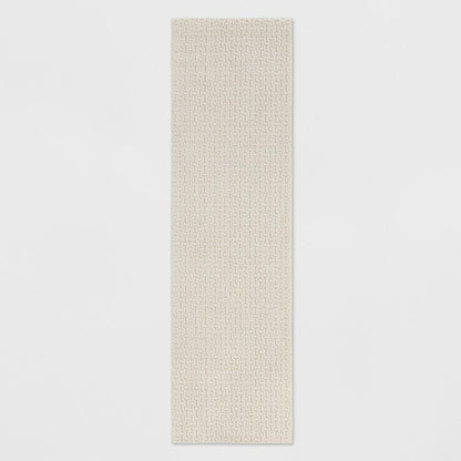 2'x7' Washable Solid Machine Tufted Runner Rug Tan - Threshold