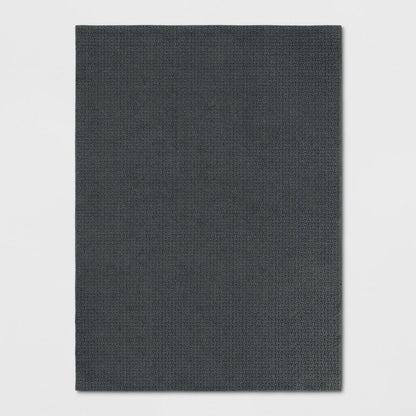 4'x5'6" Washable Solid Machine Tufted Accent Rug Gray - Threshold™